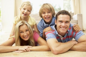 Family Having Fun At Home Together